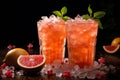 Grapefruit cocktail in tall glasses with ice hype. Royalty Free Stock Photo