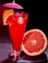 Grapefruit cocktail with umbrella 50 Royalty Free Stock Photo