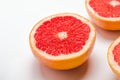Grapefruit cut in halves on a white background. Useful tropical citrus diet fruit Royalty Free Stock Photo