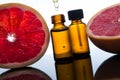 Grapefruit essential oil, extract, essence, in amber bottle with dropper