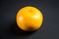 Grapefruit isolated on a black background Royalty Free Stock Photo