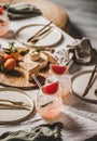 Grapefruit margaritas in glasses with straws, snacks for home party Royalty Free Stock Photo