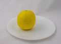 A Grapefruit on a Plate