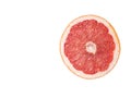 Grapefruit in section closeup, on a white background Royalty Free Stock Photo