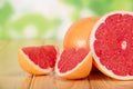 Grapefruit segments on a wooden table