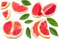 Grapefruit with slices and green leaves isolated on white background top view. clipping path Royalty Free Stock Photo
