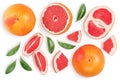 Grapefruit and slices with leaves isolated on white background. Top view. Flat lay. With clipping path and full depth of Royalty Free Stock Photo