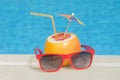 Grapefruit and sunglasses - poolside Royalty Free Stock Photo