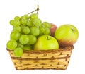 Grapes and apples in a basket isolated on a white background close-up Royalty Free Stock Photo