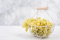 Fresh grapes in a basket on a textured background Royalty Free Stock Photo