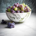 Grapes in a bowl on a marble background. Selective focus. Royalty Free Stock Photo