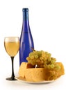 Grapes, cheese and a glass