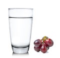 Grapes and glass of water on over white background Royalty Free Stock Photo