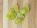 Grapes heap on wooden background Royalty Free Stock Photo