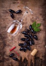 Grapes, red wine, glass, corkscrews and cork Royalty Free Stock Photo