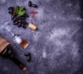 Grapes, red wine, glass, corkscrews and cork Royalty Free Stock Photo