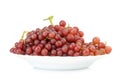 grapes seedless red on dish isolated on white background Royalty Free Stock Photo