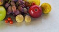 Grapes and various autumn fruits on the table Royalty Free Stock Photo