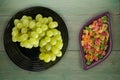 Grapes on a wooden background. grapes on a plate Royalty Free Stock Photo