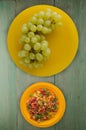 grapes on a wooden background. grapes on a plate . Royalty Free Stock Photo