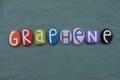 Graphene, a single layer of carbon atom, creative text composed with multi colored stone letters Royalty Free Stock Photo