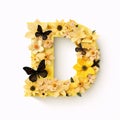 Letter D made of yellow paper flowers and butterflies isolated on white background Royalty Free Stock Photo