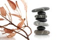 Graphic composition with balancing pebbles and branches