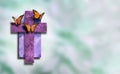 Graphic Christian Cross with new life Butterflies with soft blur background