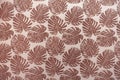 Graphic dark pink tropical leaves Monstera on pink background Wallpaper top view