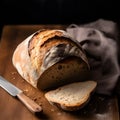 Slice of bread on a dark background. The bread stands out with its crispy crust and soft interior.