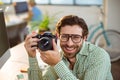 Graphic designer clicking photo from digital camera Royalty Free Stock Photo