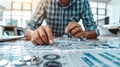 Graphic designer creating a digital infographic illustrating challenges