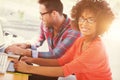 Graphic designer using a graphics tablet in her office Royalty Free Stock Photo