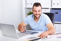 Graphic designer using a graphics tablet in a modern office Royalty Free Stock Photo