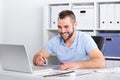 Graphic designer using a graphics tablet in a modern office Royalty Free Stock Photo