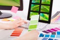 Graphic designer at work. Color samples. Royalty Free Stock Photo