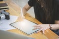 Graphic designer working on computor and graphics tablet in her working space Royalty Free Stock Photo