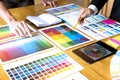 Graphic designers choose colors from the color bands samples for design .Designer graphic creativity work concept