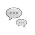 Two gray speech bubbles with ellipsis dots isolated on white background Royalty Free Stock Photo