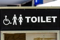 Graphic lettering toilet black and white sign