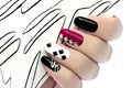 Graphic manicure. Royalty Free Stock Photo