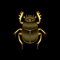 Stylized golden scarab on black background.