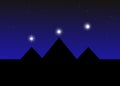 Pyramids and Orion Belt stars at night Royalty Free Stock Photo