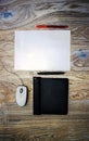 Graphic tablet, computer mouse, sheet of paper and marker on the table,