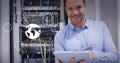 Graphic of world in center connected with bubbles, over caucasian man standing next to server rack Royalty Free Stock Photo