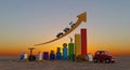 Graphical representation of economic growth with bar graphs and an upward