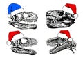 Graphical set of skulls of dinosaurs in red Christmas hats, new year set