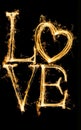 graphics of a burning love inscription on a dark background