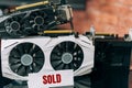 Graphics cards of various sizes and configurations on black table. Part of computer for gaming and cryptocurrency mining Royalty Free Stock Photo