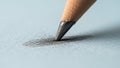 A graphite core is sharpened to a fine point emphasizing its precision. Royalty Free Stock Photo